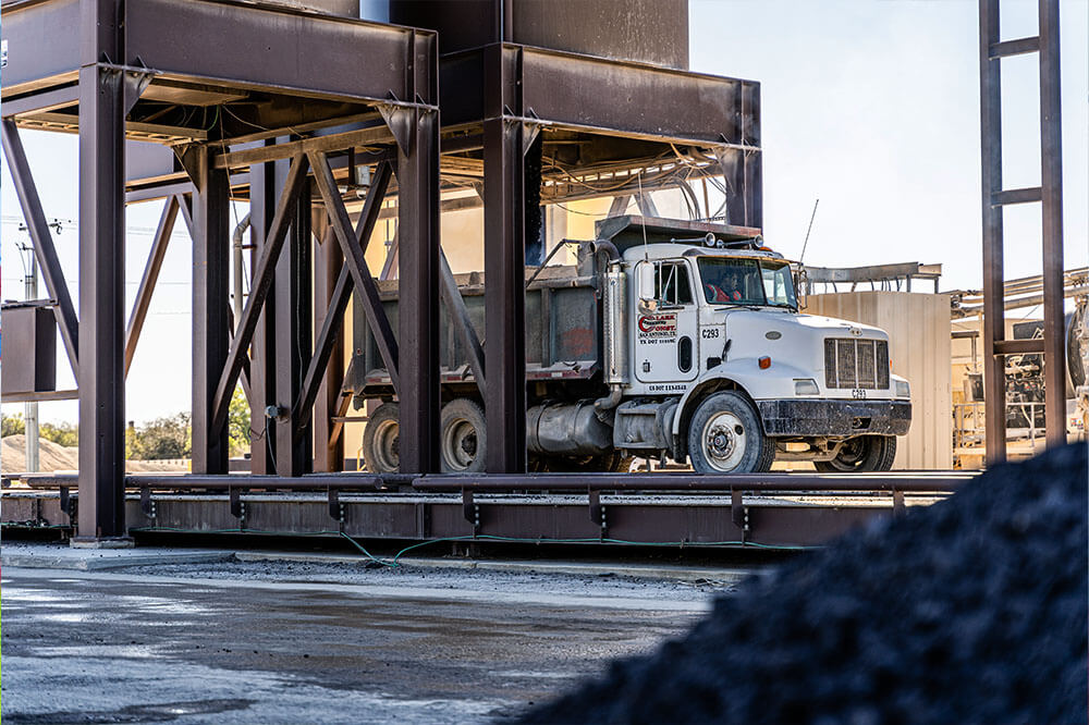 dump truck under silo